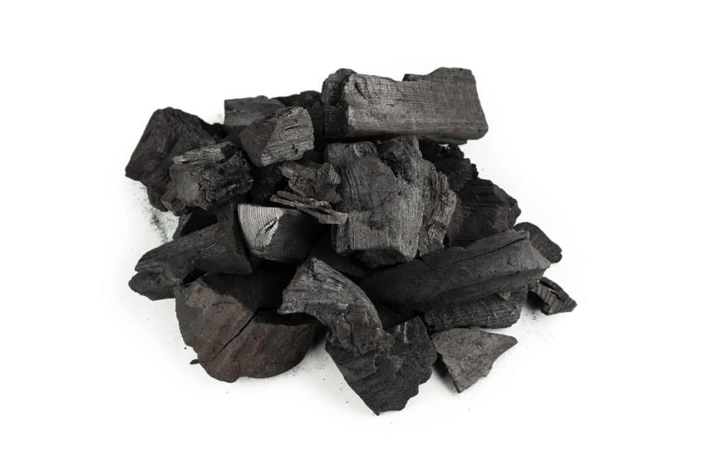 black oak coal isolated white background 1 1